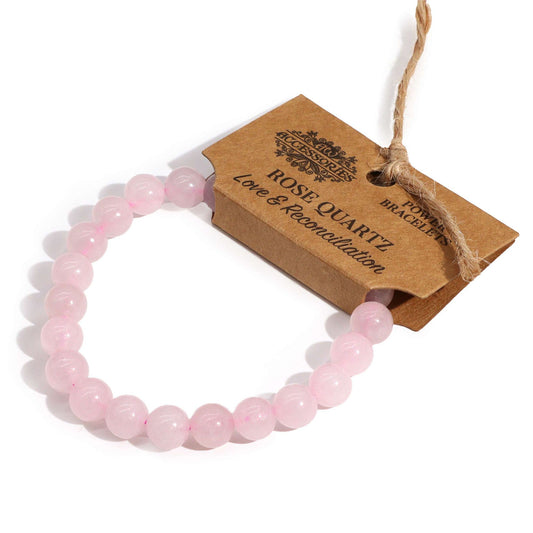 1x Power Bracelet - Rose Quartz on a white background with a brown tag.