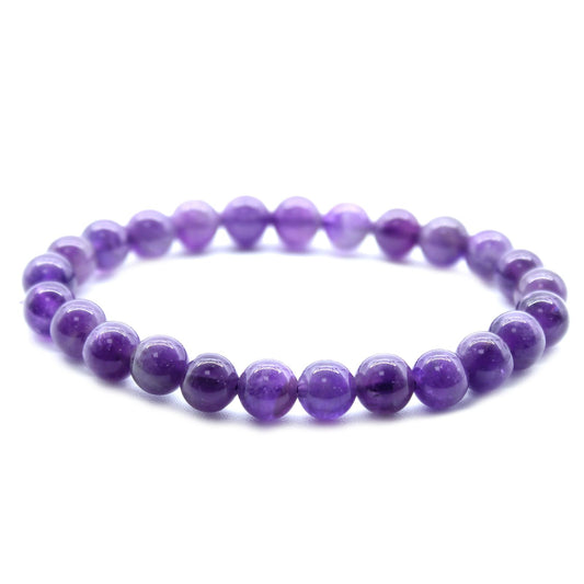 Purple Amethyst bracelet on a white background
